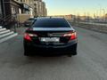 Toyota Camry 2014 года за 5 900 000 тг. в Актобе – фото 5