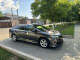 Toyota Camry 2014 годаүшін9 500 000 тг. в Шымкент