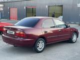 Mazda 323 1996 годаfor1 550 000 тг. в Караганда – фото 3