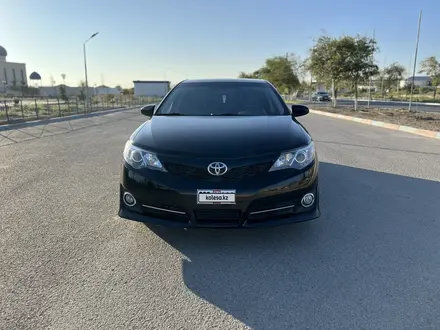 Toyota Camry 2013 года за 5 900 000 тг. в Жанаозен