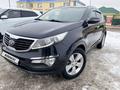 Kia Sportage 2013 года за 7 850 000 тг. в Актобе – фото 2