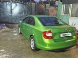 Skoda Rapid 2013 года за 2 350 000 тг. в Алматы – фото 2