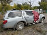 Mitsubishi L200 2012 года за 4 440 004 тг. в Астана – фото 2