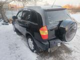 Chery Tiggo 2011 года за 2 300 000 тг. в Караганда – фото 5