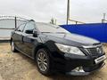 Toyota Camry 2014 года за 9 000 000 тг. в Актобе – фото 4