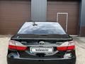 Toyota Camry 2015 года за 12 500 000 тг. в Актобе – фото 6