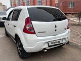 Renault Sandero 2012 года за 2 200 000 тг. в Уральск – фото 2