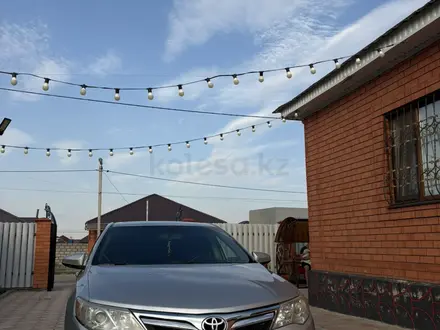Toyota Camry 2013 года за 8 800 000 тг. в Актобе