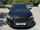 Chevrolet Aveo 2014 года за 2 900 000 тг. в Караганда – фото 2