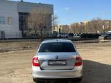 Skoda Rapid 2013 года за 3 100 000 тг. в Актобе – фото 4