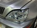 Лексус РХ300 Стекла на Фары Lexus RX за 30 000 тг. в Астана