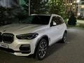 BMW X5 2018 года за 28 800 000 тг. в Алматы – фото 20