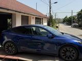 Tesla Model Y 2022 года за 16 500 000 тг. в Алматы – фото 2