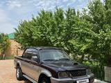 Mitsubishi L200 2004 годаүшін4 800 000 тг. в Жанаозен