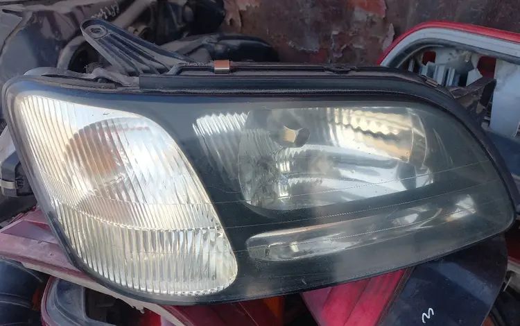 Фар передни субару оутбак за 20 000 тг. в Алматы