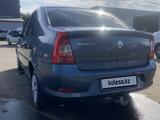 Renault Logan 2014 года за 2 200 000 тг. в Уральск – фото 3