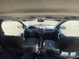 Renault Logan 2014 года за 2 200 000 тг. в Уральск – фото 5