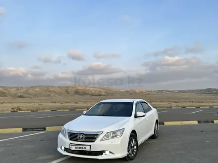 Toyota Camry 2013 года за 9 800 000 тг. в Жанаозен