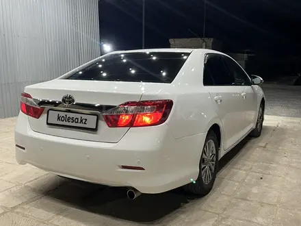 Toyota Camry 2013 года за 9 800 000 тг. в Жанаозен – фото 2