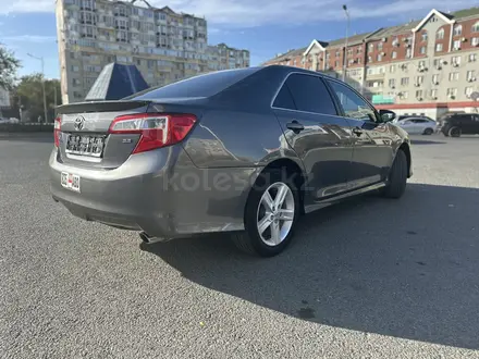 Toyota Camry 2014 года за 5 400 000 тг. в Атырау – фото 4