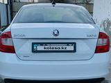 Skoda Rapid 2014 года за 4 400 000 тг. в Атырау – фото 2