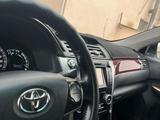 Toyota Camry 2014 года за 9 200 000 тг. в Жанаозен – фото 4