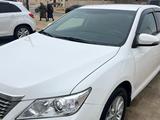 Toyota Camry 2014 года за 9 200 000 тг. в Жанаозен – фото 2