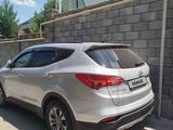 Hyundai Santa Fe 2016 года за 11 000 000 тг. в Алматы – фото 2