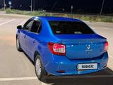 Renault Logan 2015 года за 3 500 000 тг. в Актобе – фото 4