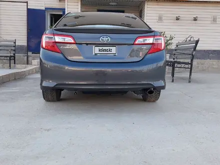 Toyota Camry 2014 года за 6 700 000 тг. в Жанаозен – фото 2