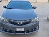 Toyota Camry 2014 года за 6 700 000 тг. в Жанаозен