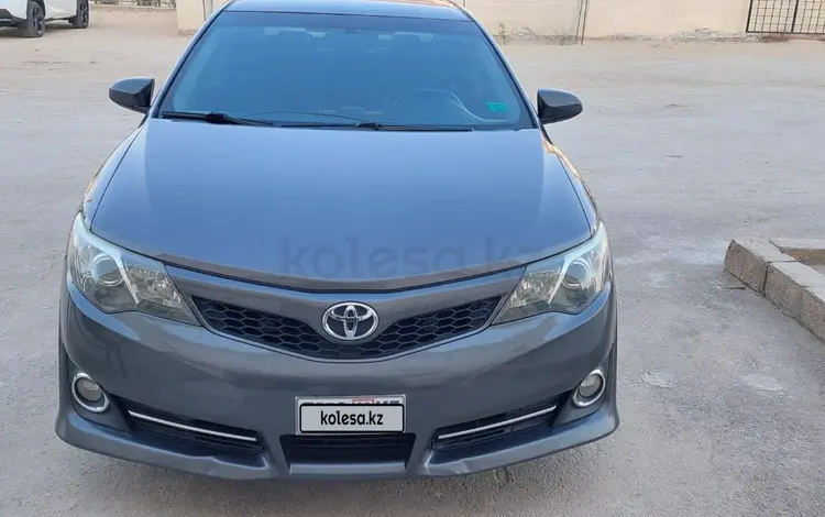 Toyota Camry 2014 года за 6 700 000 тг. в Жанаозен