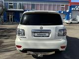 Nissan Patrol 2010 года за 14 900 000 тг. в Караганда – фото 4