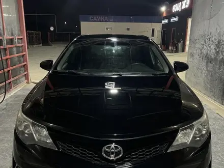 Toyota Camry 2013 года за 7 200 000 тг. в Жанаозен