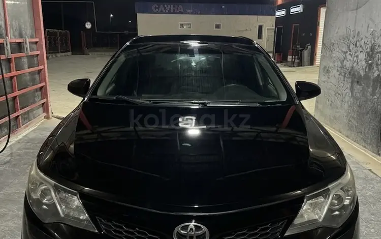Toyota Camry 2013 года за 7 200 000 тг. в Жанаозен