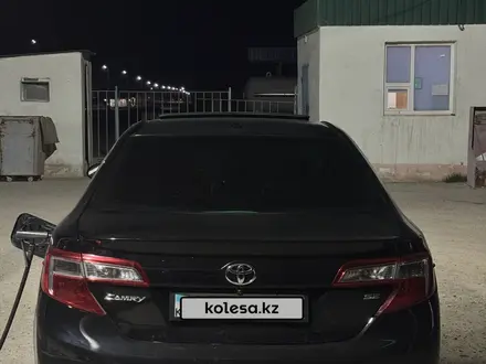 Toyota Camry 2013 года за 7 200 000 тг. в Жанаозен – фото 7