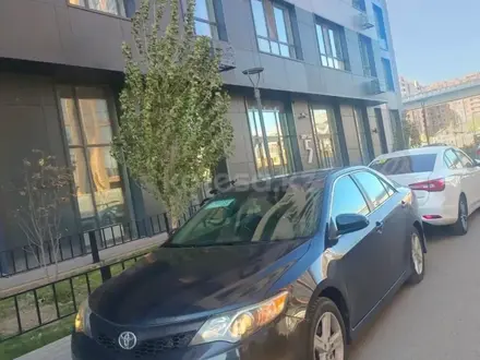 Toyota Camry 2014 года за 7 200 000 тг. в Караганда