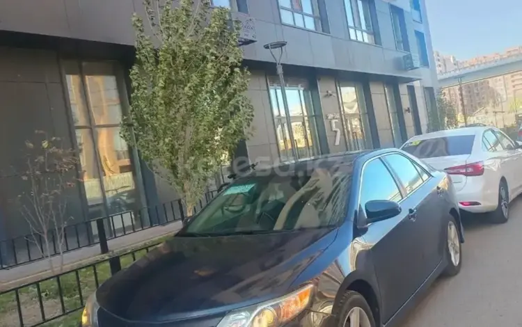 Toyota Camry 2014 года за 7 200 000 тг. в Караганда
