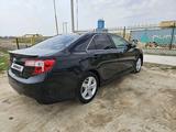 Toyota Camry 2013 года за 8 300 000 тг. в Атырау – фото 2