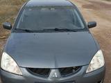 Mitsubishi Lancer 2004 годаүшін950 000 тг. в Караганда – фото 2