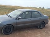 Mitsubishi Lancer 2004 годаүшін950 000 тг. в Караганда – фото 5