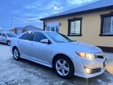 Toyota Camry 2014 года за 9 600 000 тг. в Атырау