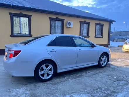 Toyota Camry 2014 года за 9 600 000 тг. в Атырау – фото 4