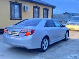 Toyota Camry 2014 года за 9 600 000 тг. в Атырау – фото 5