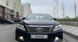 Toyota Camry 2014 года за 10 950 000 тг. в Астана