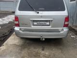 Kia Carnival 2002 года за 2 700 000 тг. в Астана