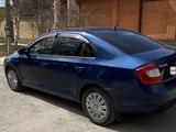 Skoda Rapid 2014 годаүшін3 950 000 тг. в Караганда – фото 2