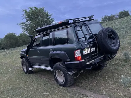 Nissan Patrol 2003 года за 8 500 000 тг. в Алматы – фото 19