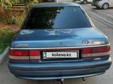 Mazda 626 1990 года за 550 000 тг. в Талдыкорган – фото 2