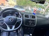 Renault Logan 2015 года за 3 800 000 тг. в Атырау – фото 2